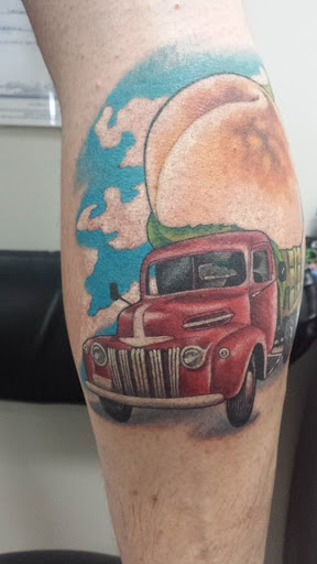 Tattoo Shop «Cosmic Tattoos», reviews and photos, 3927 Monroe Rd, Charlotte, NC 28205, USA