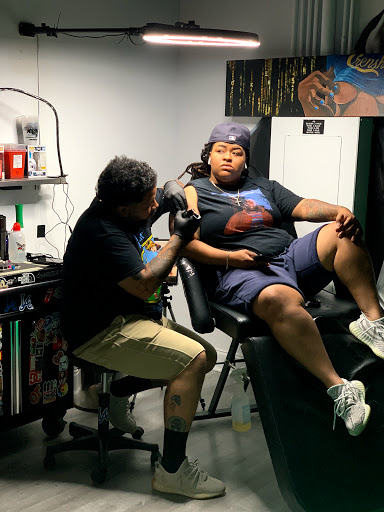 Explore sunflower thigh tattoo ideas, creative tattoo ideas in Atlanta, available at Atlanta Ink Tattoo and Piercing