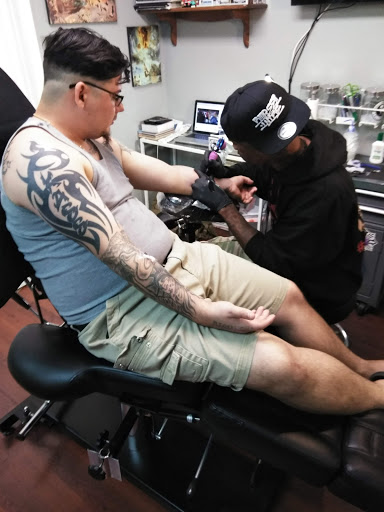 Explore name hand tattoo ideas, creative tattoo ideas in Pinellas Park, available at Lollis Studios Tattoo Company