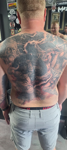 Explore men's tattoo ideas sleeve, creative tattoo ideas in Poplar Bluff, available at Divergent Studios