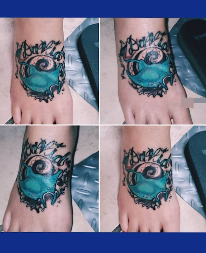 Explore biomechanical tattoo ideas, creative tattoo ideas in Englewood, available at The Original Big Daddy Tattoo & Body Piercing est.1997 est.1997