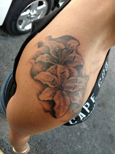 Explore mens angel tattoo ideas, creative tattoo ideas in Schenectady, available at Pure Ink Fury