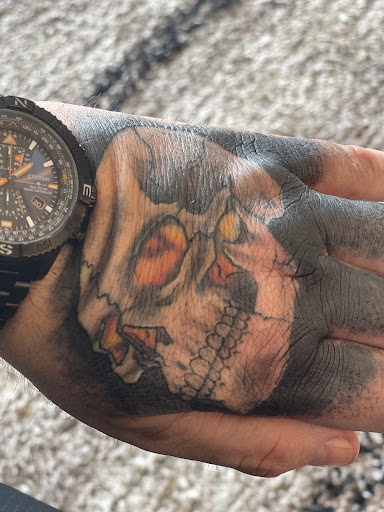 Explore black men tattoo ideas, creative tattoo ideas in Davenport, available at Fine Ink Studios Tattoos