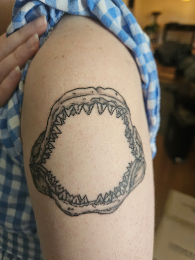 Explore chest tattoo ideas male, creative tattoo ideas in Tulsa, available at Dire Wolf Tattoo