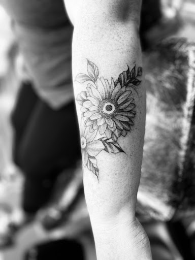 Find joker tattoo ideas for your next unique tattoo in Huntington at Golden Dagger Tattoos and Piercings