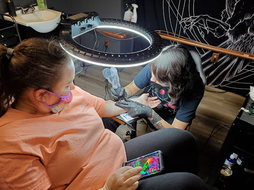 Explore half heart tattoo ideas, creative tattoo ideas in Benton, available at Relics Tattoo Studio