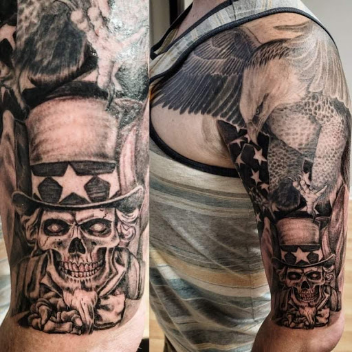 Find leg tattoo ideas for guys for your next unique tattoo in Kenosha at Kenosha Tattoo Company