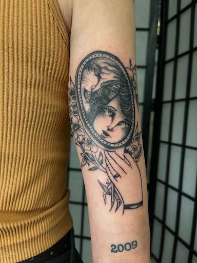 Explore mermaid tattoo ideas for females, creative tattoo ideas in Concord, available at Sterling Tattoo Club