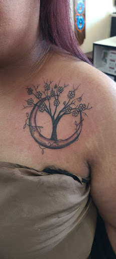 Explore under breast tattoo ideas for females, creative tattoo ideas in Garden Grove, available at Dr. Tattoo Studio