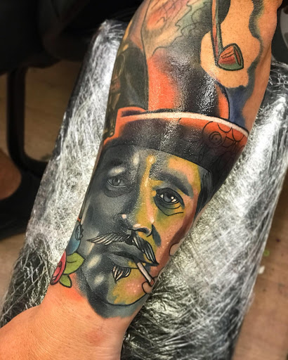 Explore coy fish tattoo ideas, creative tattoo ideas in Orlando, available at Epic Orlando Tattoo