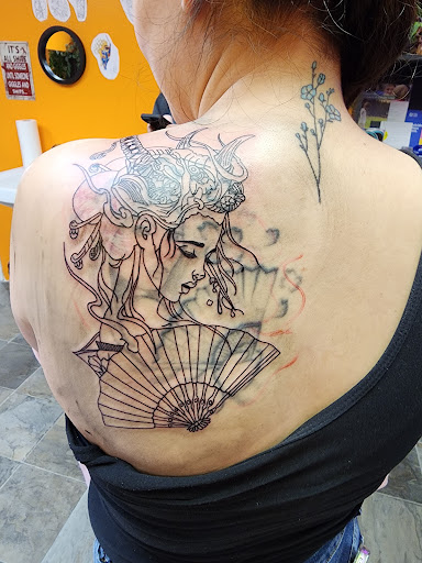 Explore cool cover up tattoo ideas, creative tattoo ideas in Dickinson, available at Creative InSight Tattoo