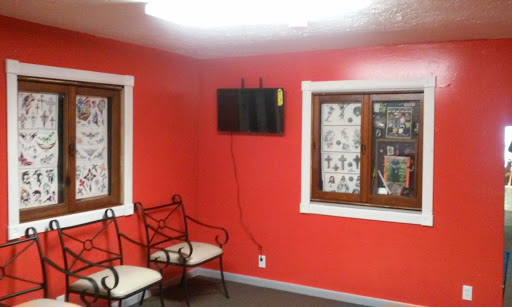 Explore back of the ear tattoo ideas, creative tattoo ideas in Dayton, available at Private Ink 2