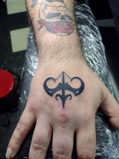 Explore wolverine tattoo ideas, creative tattoo ideas in Owosso, available at Twisted ink tattoo