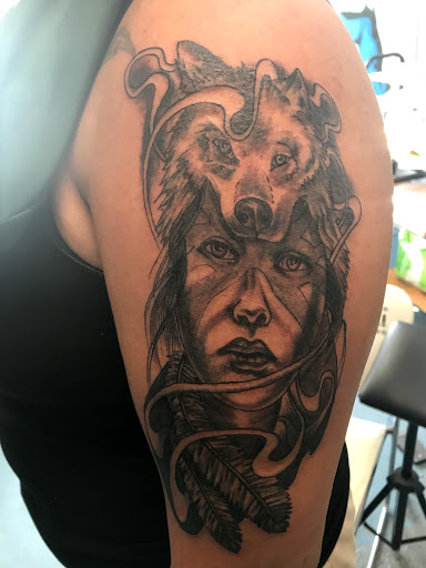 Explore arm cross tattoo ideas, creative tattoo ideas in Muncie, available at The Tattoo Studio