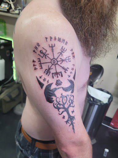 Explore race car tattoo ideas, creative tattoo ideas in Conway, available at NVUS ink