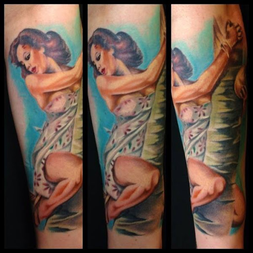 Explore hairdresser tattoo ideas, creative tattoo ideas in Spokane, available at Anchored Art Tattoo