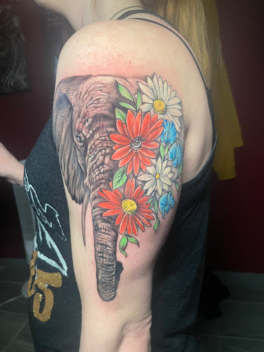 Explore small girl tattoo ideas, creative tattoo ideas in Omaha, available at Eye Candy West Tattoo shop