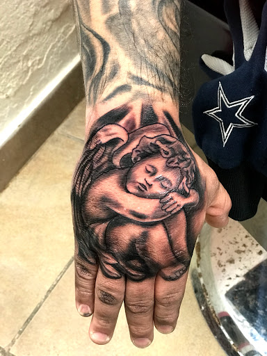 Explore full neck tattoo ideas, creative tattoo ideas in Baytown, available at Big Juniors Tattoos