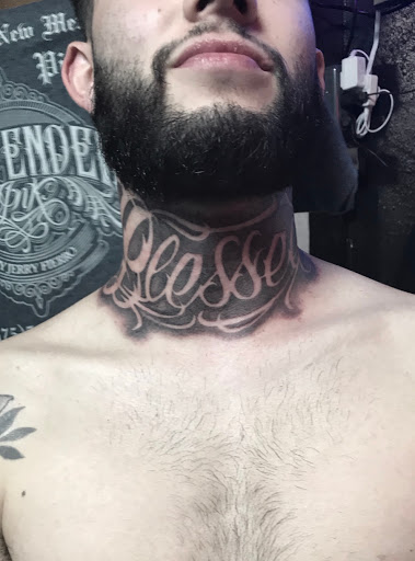 Explore female neck tattoo ideas, creative tattoo ideas in Silver City, available at Independent Ink Tattoo