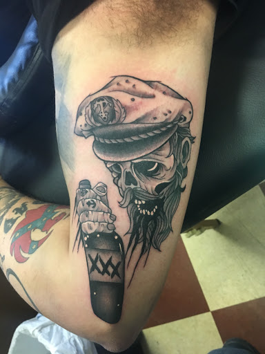 Explore bear claw tattoo ideas, creative tattoo ideas in Erie, available at Wayward Tattoo Studio