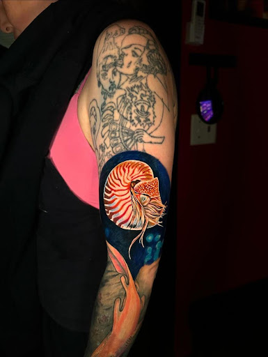 Explore men's shin tattoo ideas, creative tattoo ideas in Odessa, available at Evil Ink Tattoo