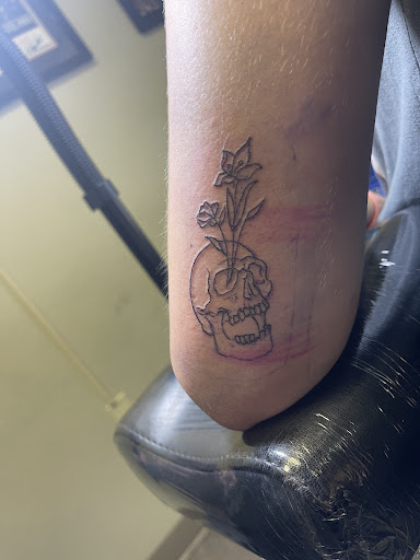 Explore flower tattoo ideas for men, creative tattoo ideas in Tuttle, available at Rebel Alliance Ink