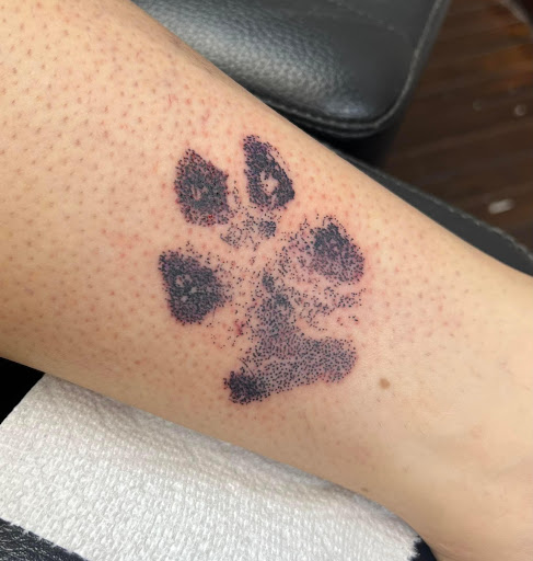 Explore wrap around arm tattoo ideas, creative tattoo ideas in Fort Wayne, available at Grade A Tattoos and Body Piercing