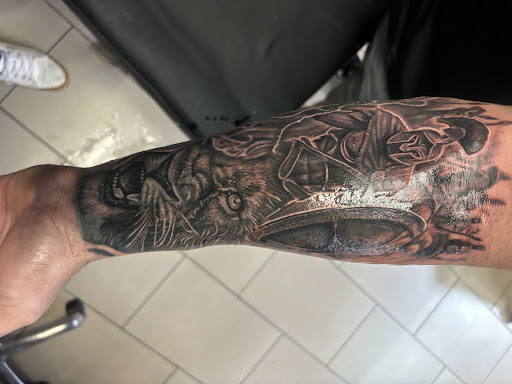 Explore mens tattoo ideas simple, creative tattoo ideas in Sarasota, available at SEVEN SINS Tattoo Studio