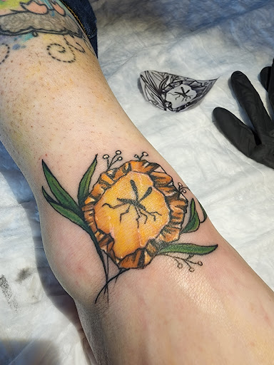 Explore family heart tattoo ideas, creative tattoo ideas in Minocqua, available at Walking Arts Tattoos