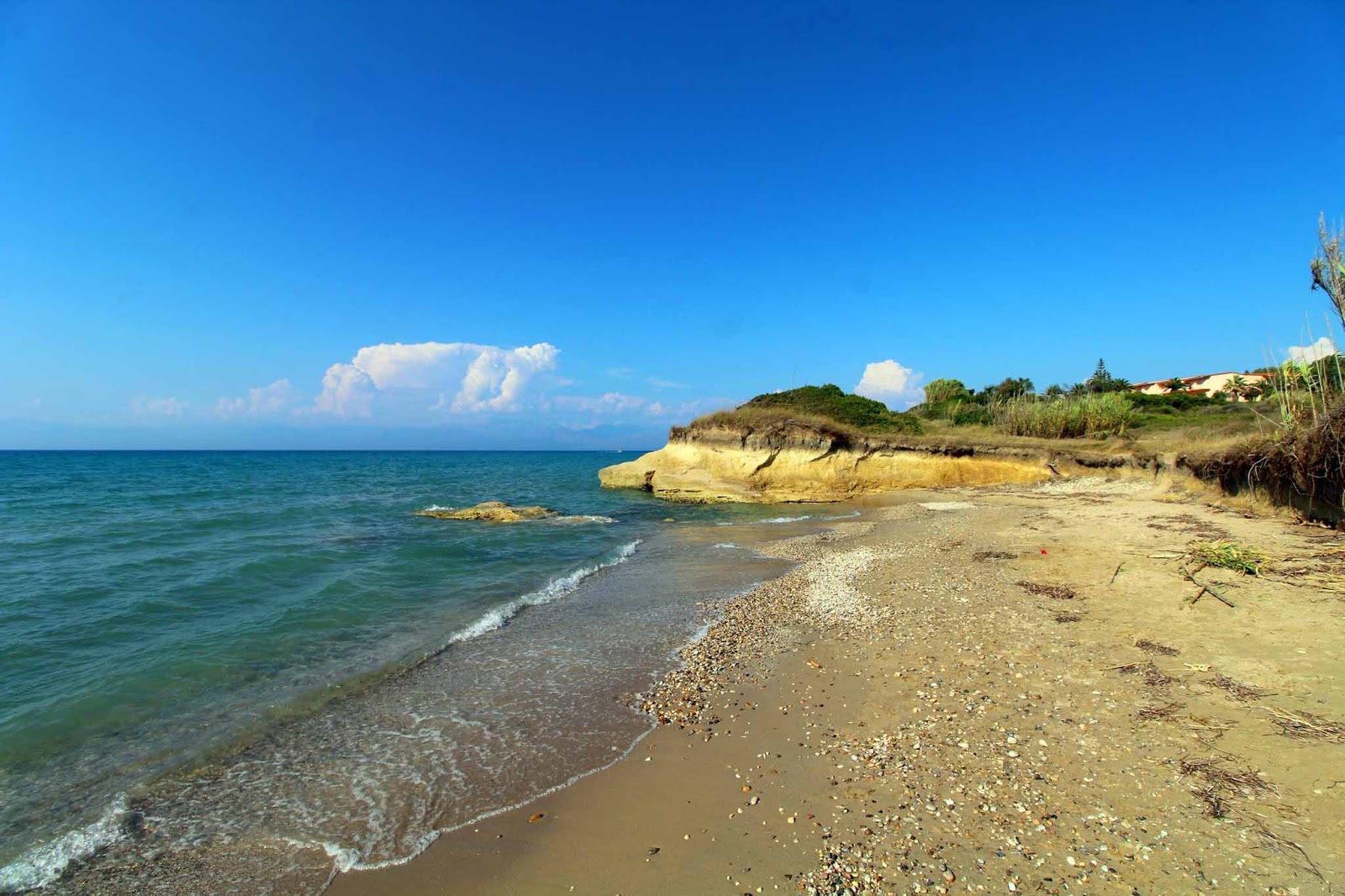 Foto von Roda beach II mit beiger sand Oberfläche