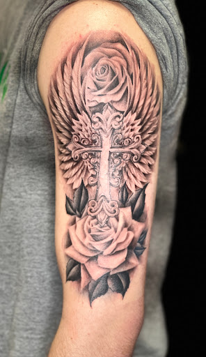 Explore black male tattoo ideas, creative tattoo ideas in Jessup, available at Savage Ink Tattoo Studio