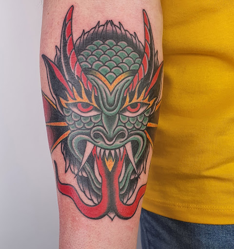 Neon Wolf Tattoo Studio