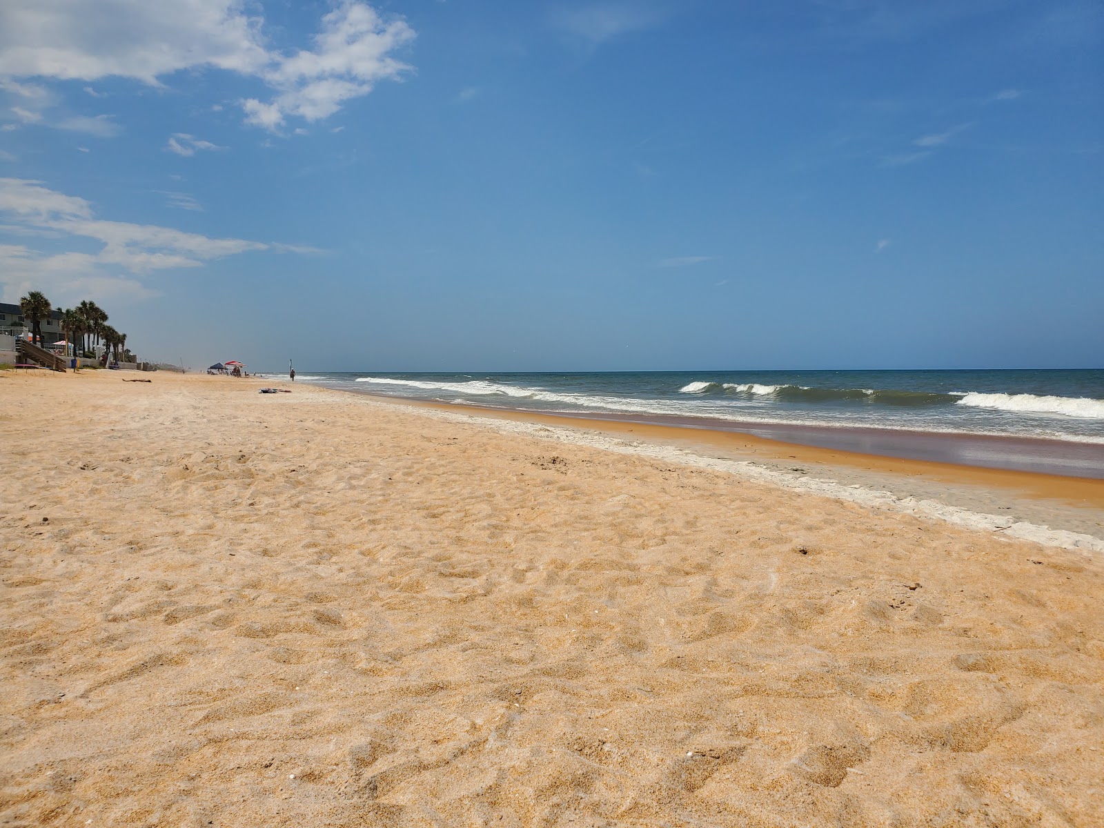 Foto av Tom Renick beach park med ljus skal sand yta