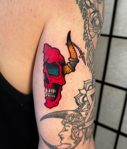 Explore five finger death punch tattoo ideas, creative tattoo ideas in Bradley, available at The 22 Tattoo Company