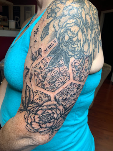 Explore ladies shoulder tattoo ideas, creative tattoo ideas in Seymour, available at Sacred Art Tattoo