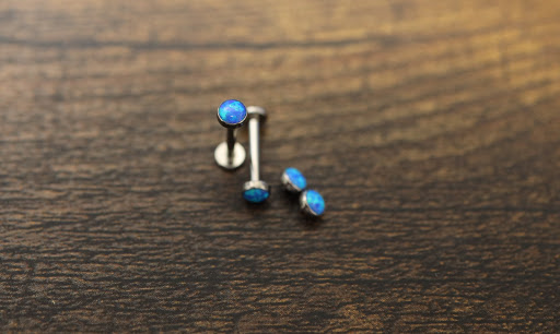 Explore tattoo ideas for top of foot, creative tattoo ideas in Des Moines, available at Axiom Body Piercing Studio