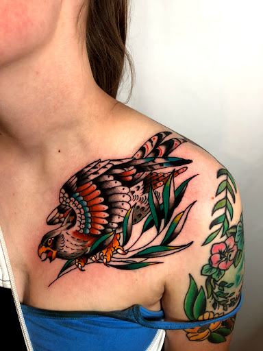 Find dino tattoo ideas for your next unique tattoo in Johnson City at Gold Cross Tattoo Co.