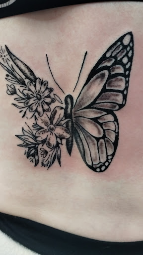Explore axe tattoo ideas, creative tattoo ideas in Brodhead, available at Sinnin Skinn InkWorks