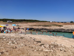 Foto von Spiaggia della Costa Merlata mit kleine bucht