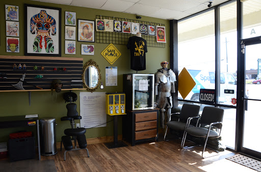 Tattoo Shop «Tattoo Machine Gun- Clark», reviews and photos, 1705 Charlestown New Albany Rd a, Jeffersonville, IN 47130, USA