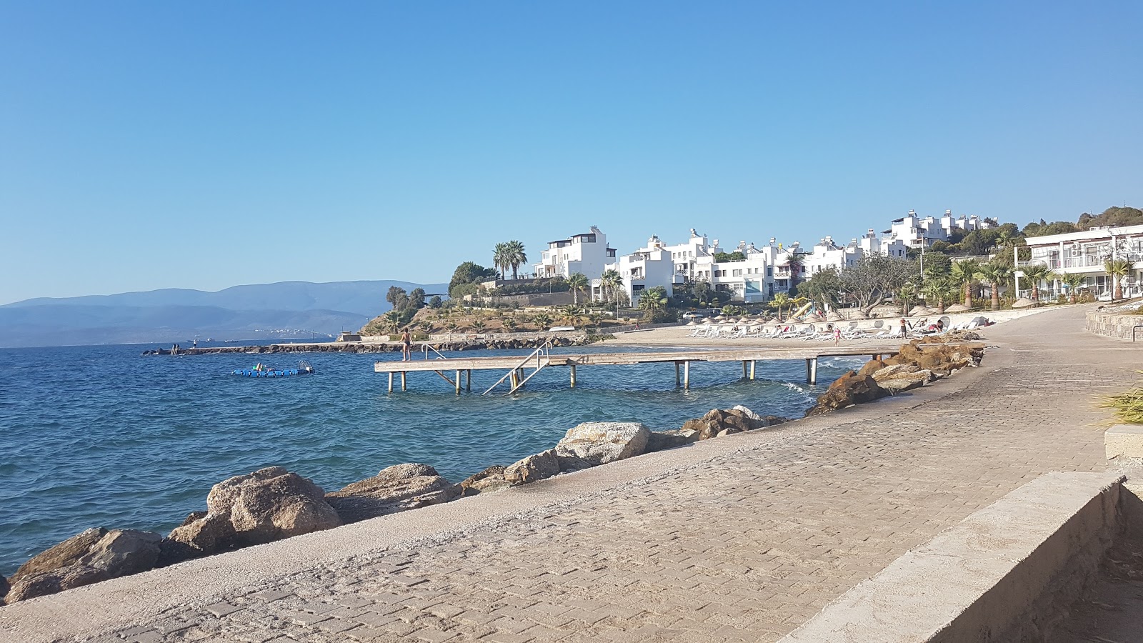 Fotografie cu Oba Beach cu o suprafață de nisip strălucitor