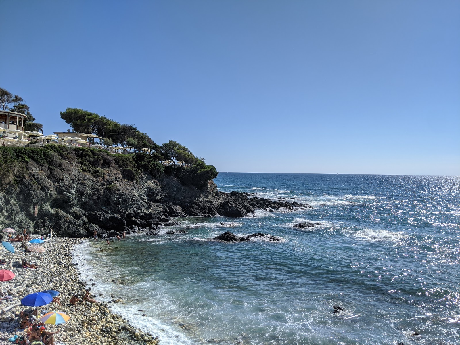 Foto van Spiaggia Le Forbici met kleine baai