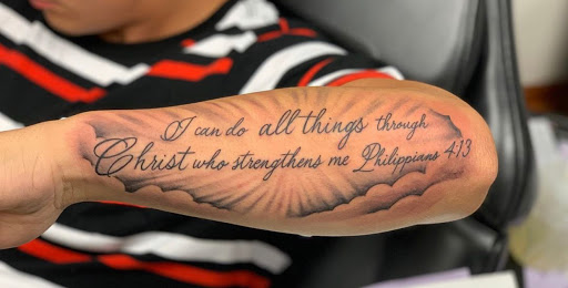 Explore foot print tattoo ideas, creative tattoo ideas in Fort Wayne, available at Grade A Tattoos and Body Piercing