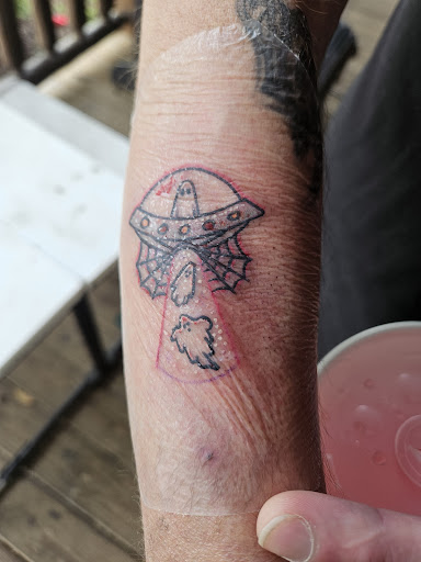 Explore parrot tattoo ideas, creative tattoo ideas in Sevierville, available at Jaded Art Collective