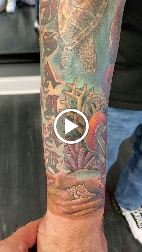 Explore tree tattoo ideas for men, creative tattoo ideas in Dover, available at Karma Theory Tattoos