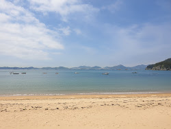 Cousin Beach'in fotoğrafı geniş bir kıyı şeridi ile birlikte