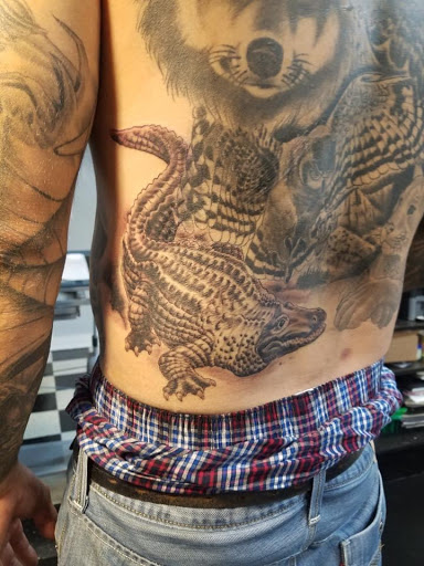 Explore cross tattoo ideas for females, creative tattoo ideas in Pelham, available at Tattoo Fever