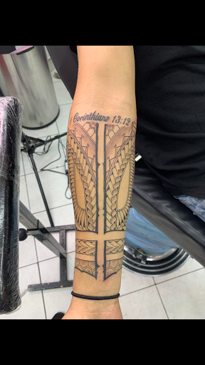 Explore finger lettering tattoo ideas, creative tattoo ideas in Sparks, available at Tidal Wave Tattoo