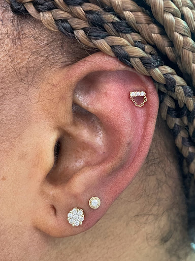 Explore medusa tattoo ideas thigh, creative tattoo ideas in Saint Paul, available at Electric Strawberry Piercing