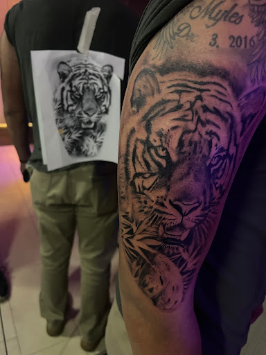 Explore electrical tattoo ideas, creative tattoo ideas in Lakeville, available at Savage Ink